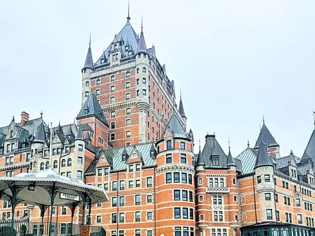 A destination meeting venue housed in a large red brick building with a clock tower.